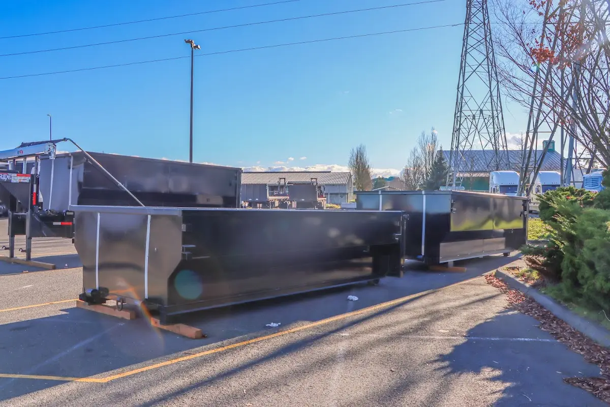 Roll-off dumpster ready for waste disposal at job site for Construction Dumpster Rental in Clive
